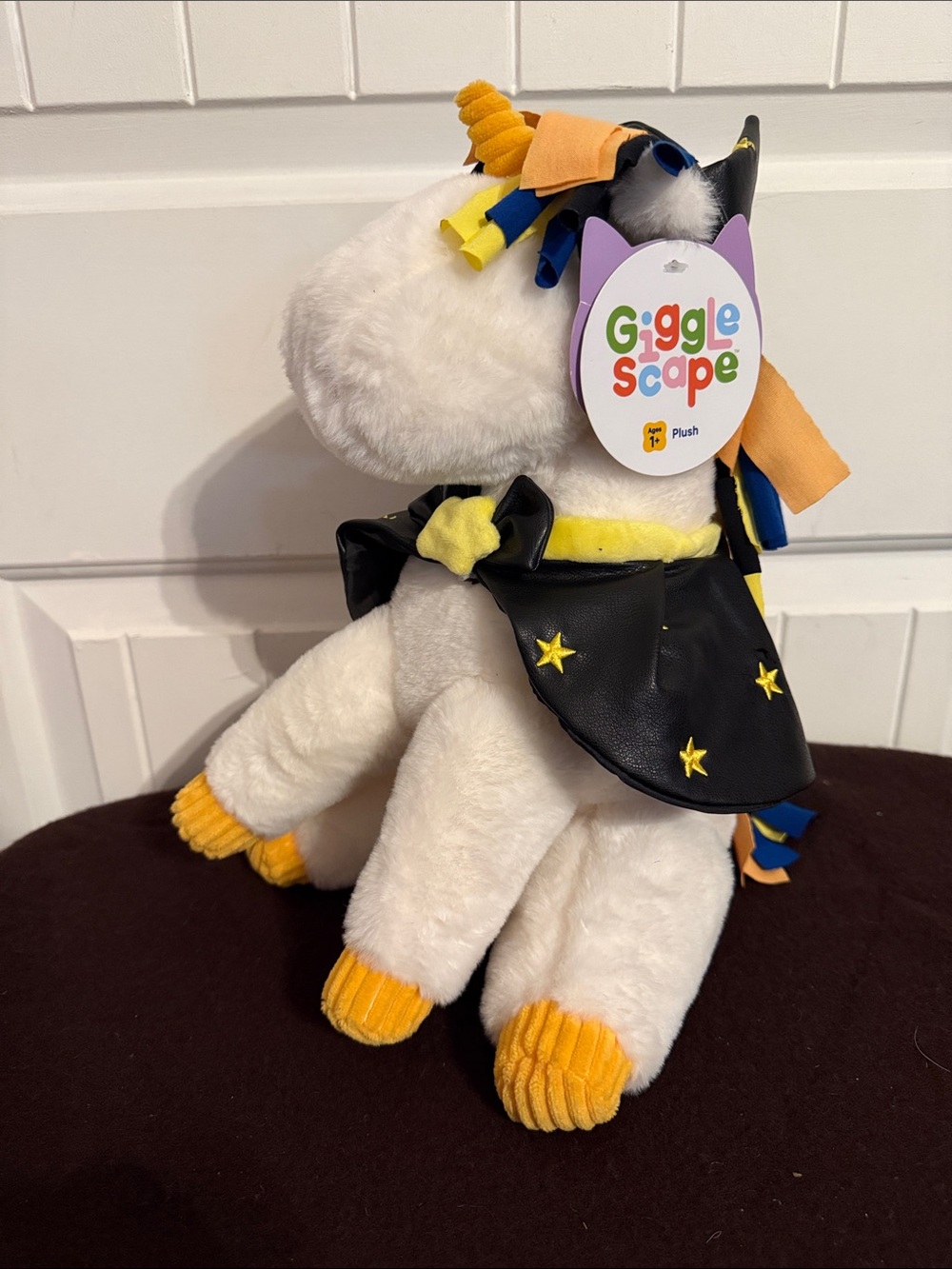 GiggleScape Plush Unicorn with Black Star Cape and Yellow Accents